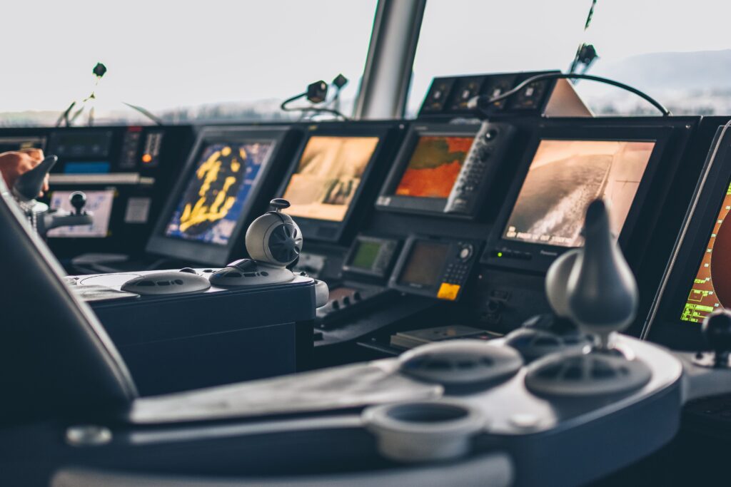 Home High-tech nautical cockpit showcasing advanced navigation systems and controls.